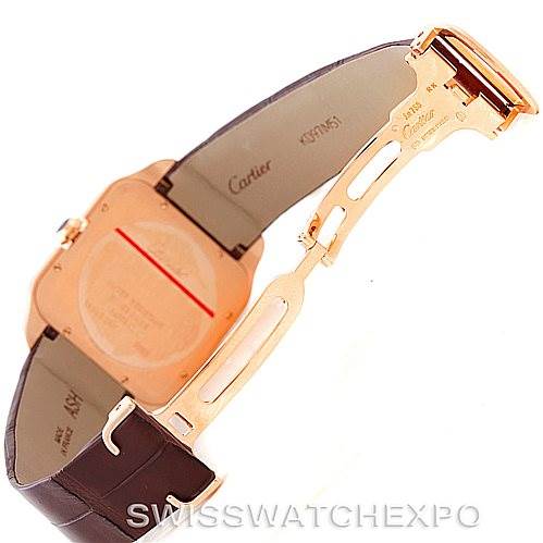 The image displays the back view of a Cartier Santos Dumont W2006951 Men's Rose Gold Silver Dial W2006951 Men's Rose Gold Silver Dial watch, highlighting its case back, strap, and deployment clasp.