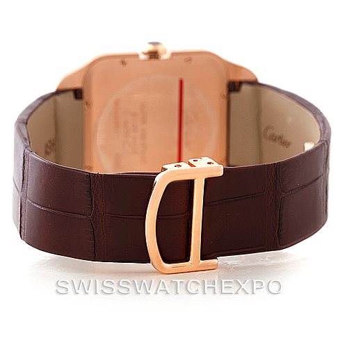 This image shows the back view of a Cartier Santos Dumont W2006951 Men's Rose Gold Silver Dial W2006951 Men's Rose Gold Silver Dial watch, focusing on its brown leather strap and gold buckle.
