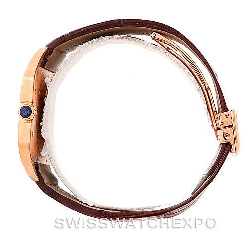 The image shows a side view of a Cartier Santos Dumont W2006951 Men's Rose Gold Silver Dial W2006951 Men's Rose Gold Silver Dial watch, highlighting the crown, case, and leather strap.