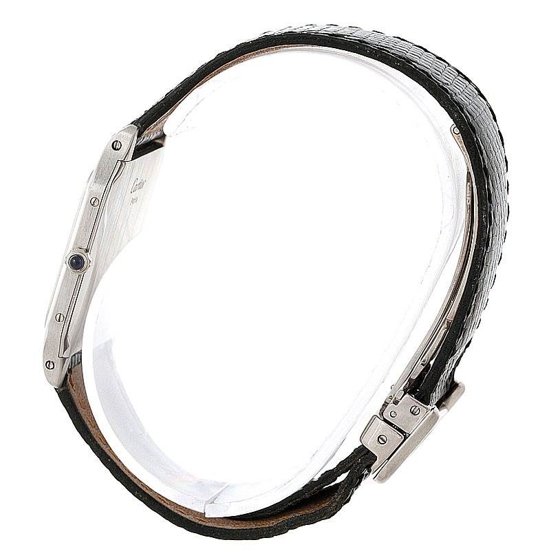 The image shows a side view of a Cartier Santos Dumont 15751 Men's Platinum White Dial 15751 Men's Platinum White Dial watch, featuring its profile, crown, and leather strap.