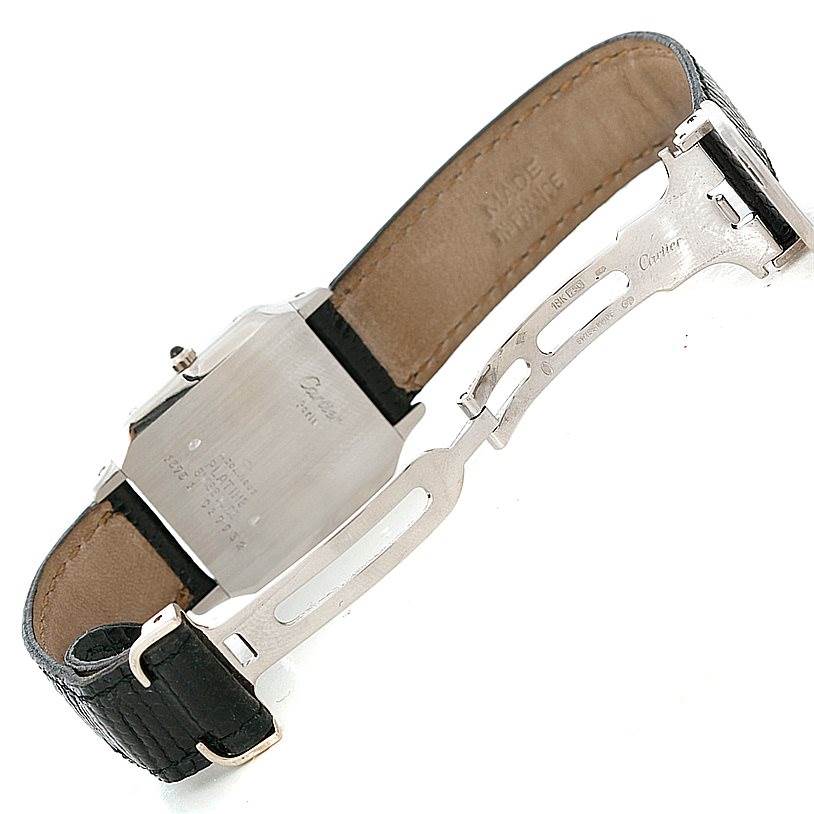 This image shows the back case and the opened clasp of the Cartier Santos Dumont 15751 Men's Platinum White Dial 15751 Men's Platinum White Dial watch, viewed from the underside.