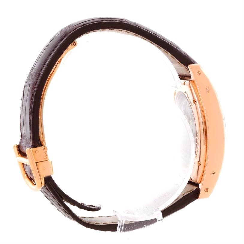 This image shows a side view of the Cartier Tortue W1543651 Men's Rose Gold Silver Dial W1543651 Men's Rose Gold Silver Dial watch, highlighting its strap, buckle, and case.