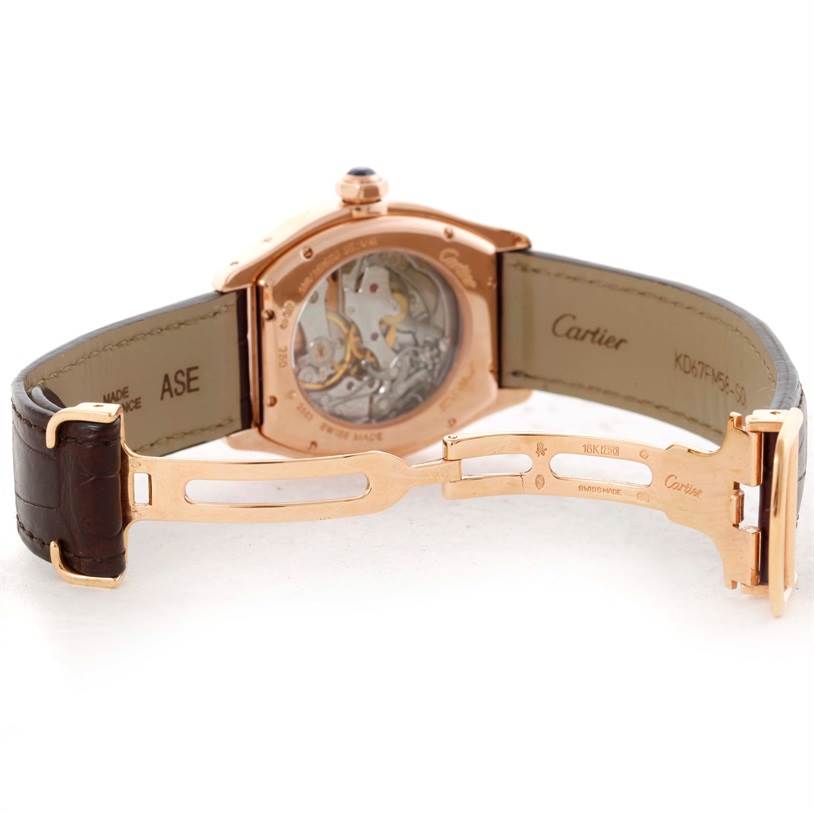 The image shows the back view of a Cartier Tortue W1543651 Men's Rose Gold Silver Dial W1543651 Men's Rose Gold Silver Dial watch with its open clasp and visible movement.