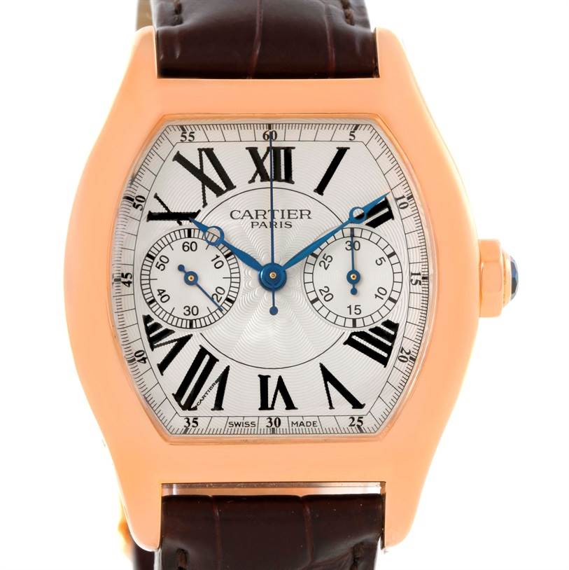 The Cartier Tortue W1543651 Men's Rose Gold Silver Dial W1543651 Men's Rose Gold Silver Dial watch is shown from the front, displaying its face, hands, dial, and leather strap.
