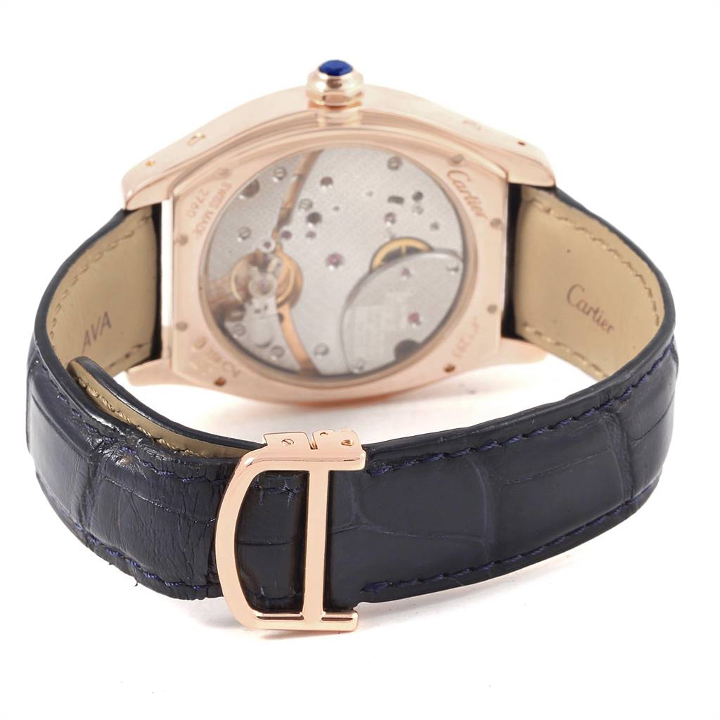 The image shows the back view of a Cartier Tortue W1545851 Men's Rose Gold Silver Dial W1545851 Men's Rose Gold Silver Dial watch, highlighting its movement and leather strap with a rose gold buckle.