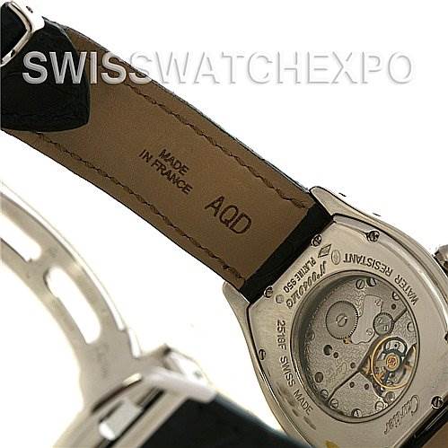 The image shows the back view of a Cartier Tortue W1546151 Platinum Silver Dial W1546151 Platinum Silver Dial watch, highlighting its open caseback and leather strap.