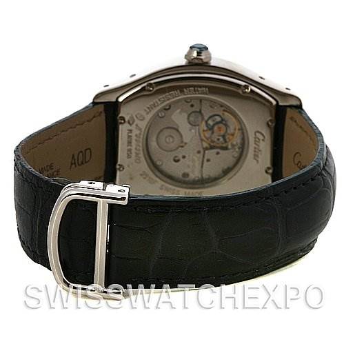 The image shows the back view of the Cartier Tortue W1546151 Platinum Silver Dial W1546151 Platinum Silver Dial watch, highlighting the movement and the leather strap with a metal buckle.