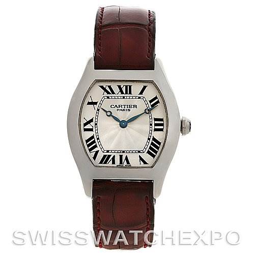 This image shows a Cartier Tortue W1546151 Platinum Silver Dial W1546151 Platinum Silver Dial watch from a front view, highlighting its silver dial with Roman numerals, blue hands, and a brown leather strap.