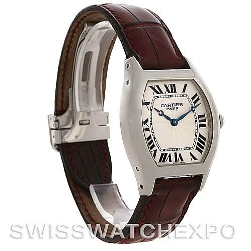 This image shows a side-facing angle of a Cartier Tortue W1546151 Platinum Silver Dial W1546151 Platinum Silver Dial watch with a visible face, brown leather strap, and clasp.