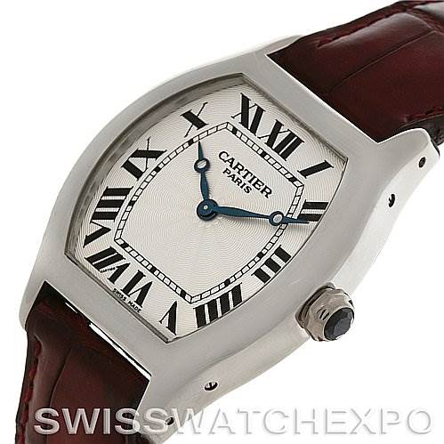 This image shows a close-up view of the Cartier Tortue W1546151 Platinum Silver Dial W1546151 Platinum Silver Dial model watch, including the dial, case, crown, and part of the leather strap.