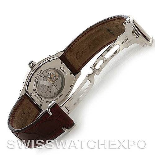 This image shows the back and interior mechanism of a Cartier Tortue W1546151 Platinum Silver Dial W1546151 Platinum Silver Dial model with a focus on the watch's open clasp and inner casing.