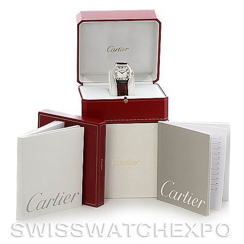 The image shows a Cartier Tortue W1546151 Platinum Silver Dial W1546151 Platinum Silver Dial watch at a front angle, in its box, accompanied by manuals and warranty cards.
