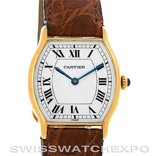 This image shows the face and strap of a Cartier Tortue Women's Yellow Gold White Dial Women's Yellow Gold White Dial watch at a straight-on angle.