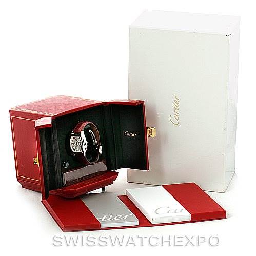 The image shows the Cartier Tortue W1540551 Men's Platinum Silver Dial W1540551 Men's Platinum Silver Dial watch at a three-quarter angle, along with its red case, white outer box, and accompanying booklets.