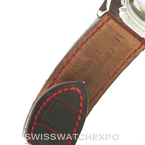 This image shows the back of the leather strap of the Cartier Tortue W1540551 Men's Platinum Silver Dial W1540551 Men's Platinum Silver Dial watch, highlighting the stitching and part of the case.
