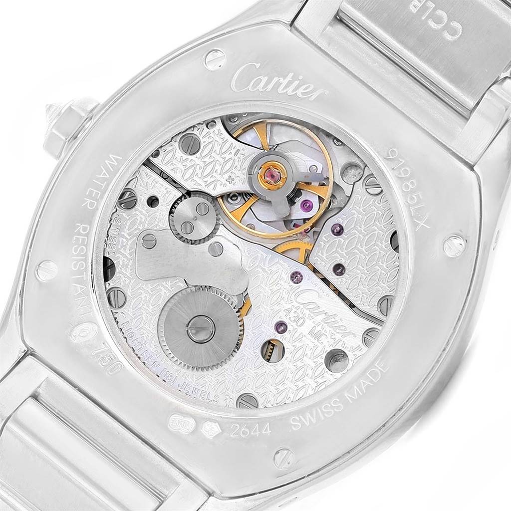 This image shows the back view of the Cartier Tortue WA5072W9 Women's White Gold Silver Dial WA5072W9 Women's White Gold Silver Dial watch, showcasing its intricate movement and internal mechanics.