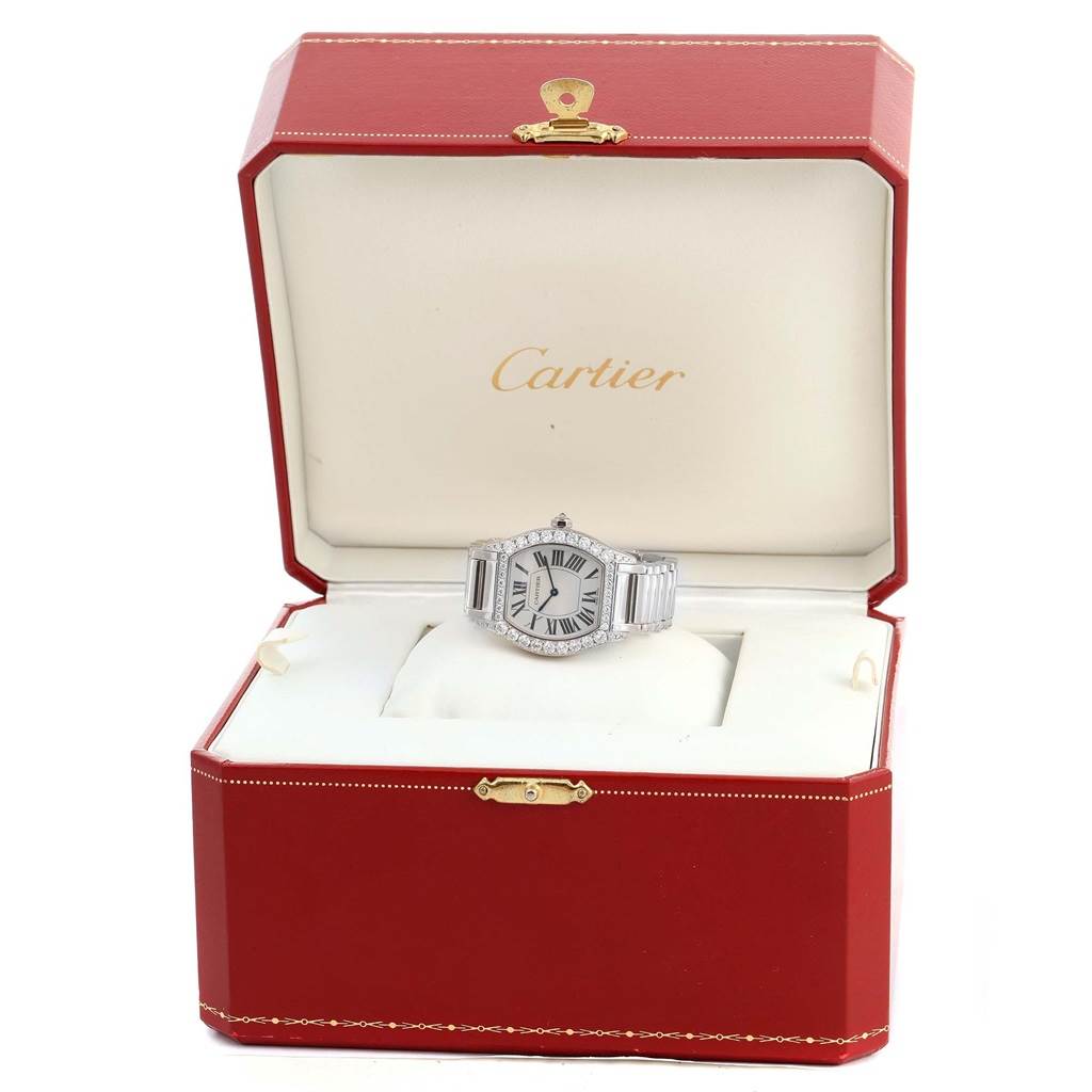 The Cartier Tortue WA5072W9 Women's White Gold Silver Dial WA5072W9 Women's White Gold Silver Dial watch is displayed front-on in an open red and white Cartier box.