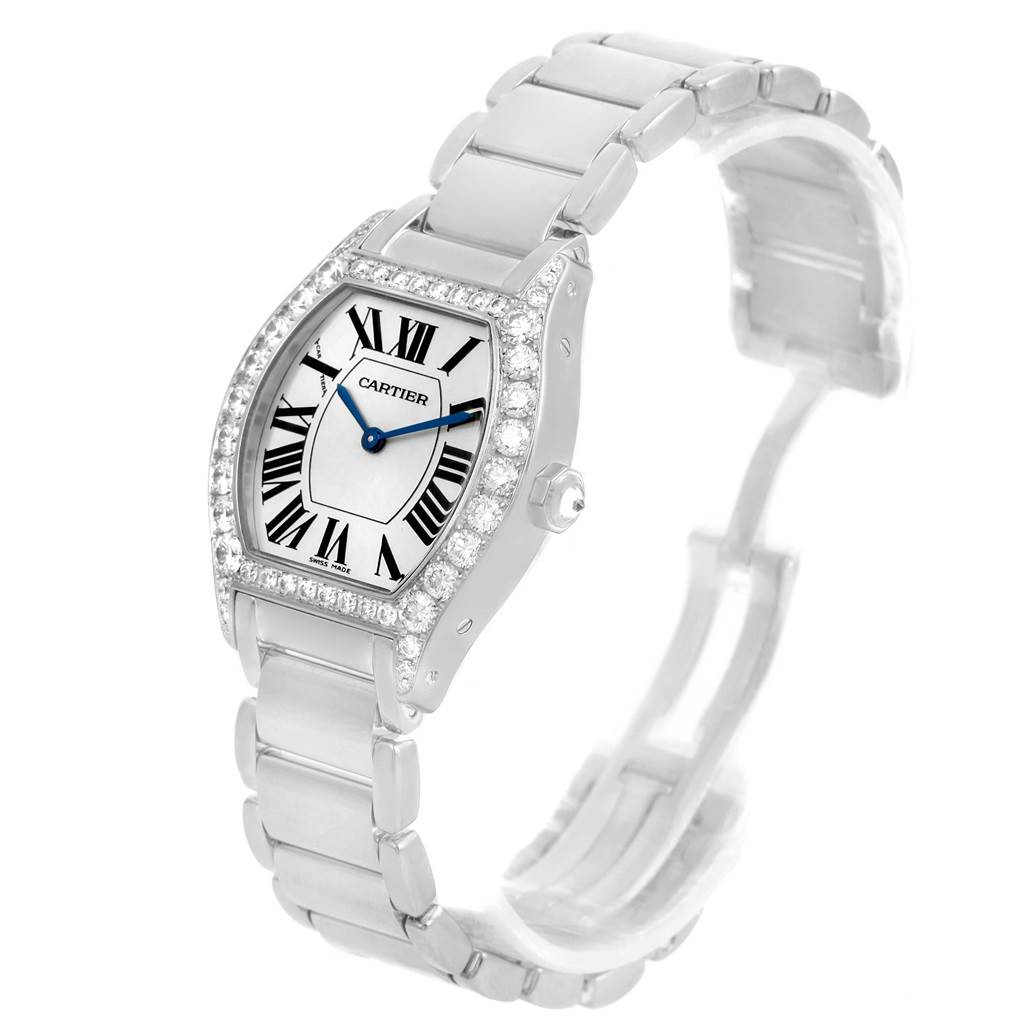 The image shows a Cartier Tortue WA5072W9 Women's White Gold Silver Dial WA5072W9 Women's White Gold Silver Dial watch at a slight angle, highlighting its face, bezel, and stainless steel bracelet.