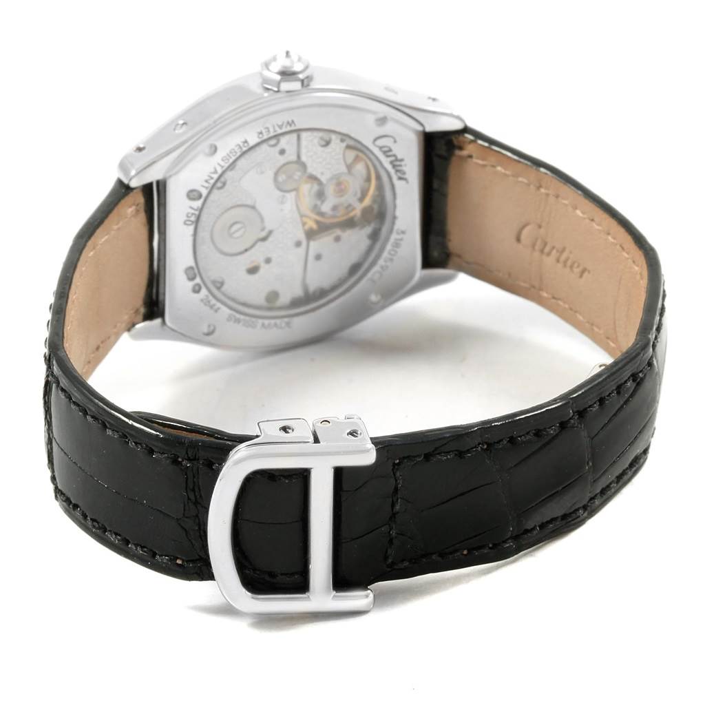 The image shows the back of a Cartier Tortue WA507231 Women
s White Gold Silver Dial WA507231 Women
s White Gold Silver Dial watch, highlighting the movement, case back, and leather strap with a buckle.