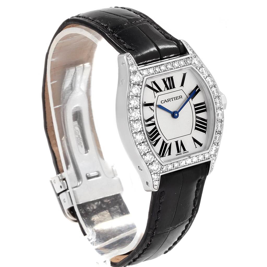 The image shows a Cartier Tortue WA507231 Women
s White Gold Silver Dial WA507231 Women
s White Gold Silver Dial watch at a front-left angle, highlighting its face, bezel, and black leather strap.