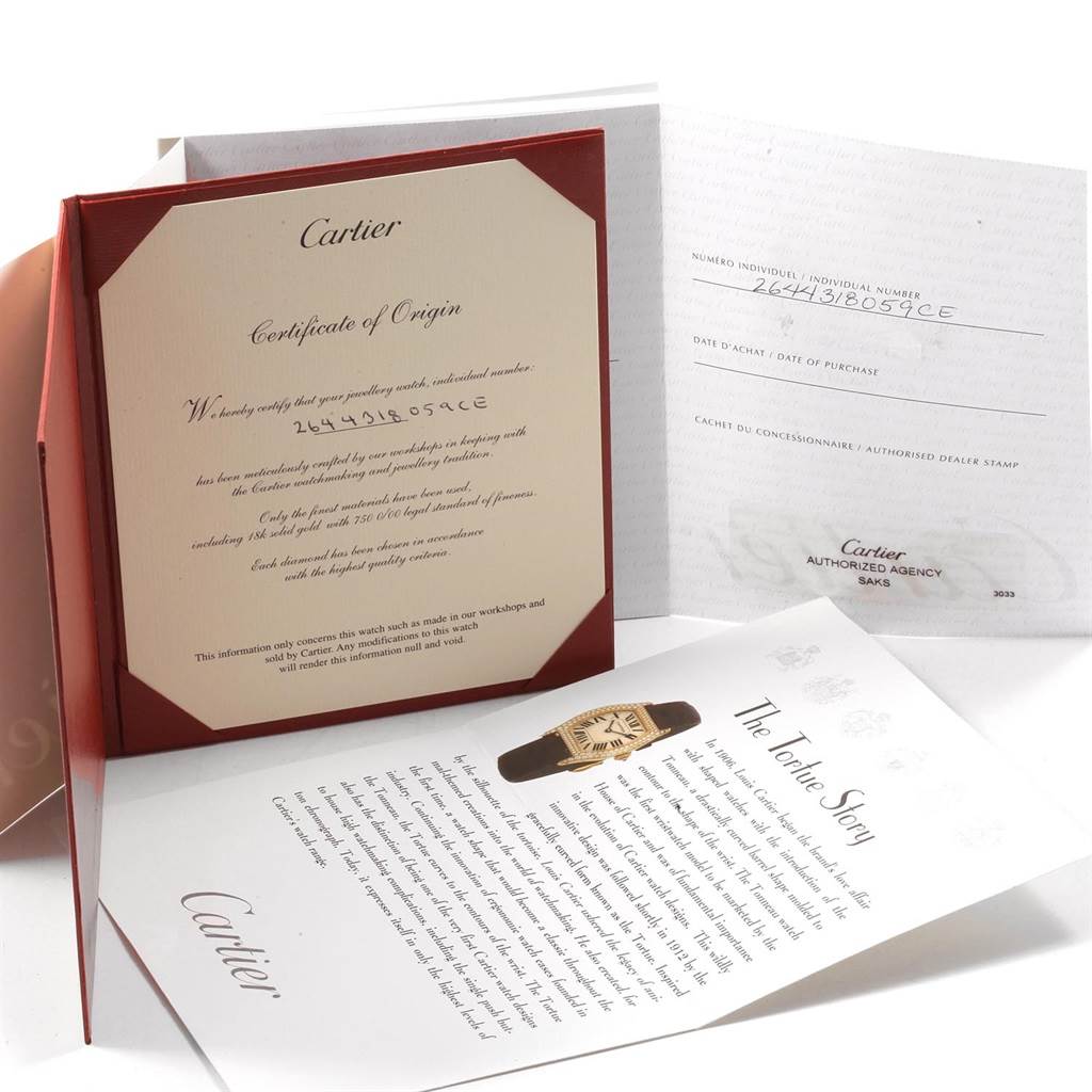 The image shows the Certificate of Origin and additional documentation for the Cartier Tortue WA507231 Women
s White Gold Silver Dial WA507231 Women
s White Gold Silver Dial watch model.