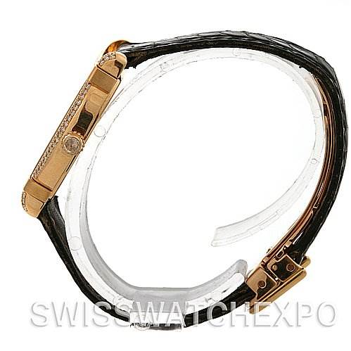 The image shows a side profile view of a Cartier Tortue Women
s Yellow Gold Silver Dial Women
s Yellow Gold Silver Dial model watch, highlighting the case and strap.