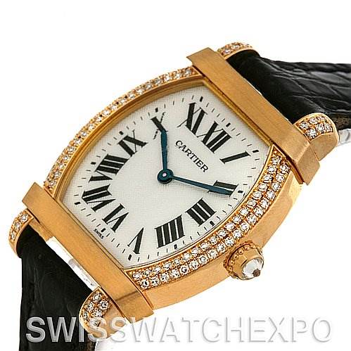 This image shows a close-up view of a Cartier Tortue Women
s Yellow Gold Silver Dial Women
s Yellow Gold Silver Dial watch, highlighting its diamond bezel, Roman numeral dial, and leather strap.