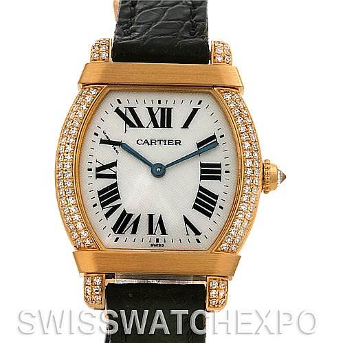 This image shows a front view of the Cartier Tortue Women
s Yellow Gold Silver Dial Women
s Yellow Gold Silver Dial watch, highlighting its face, hands, bezel, and strap.