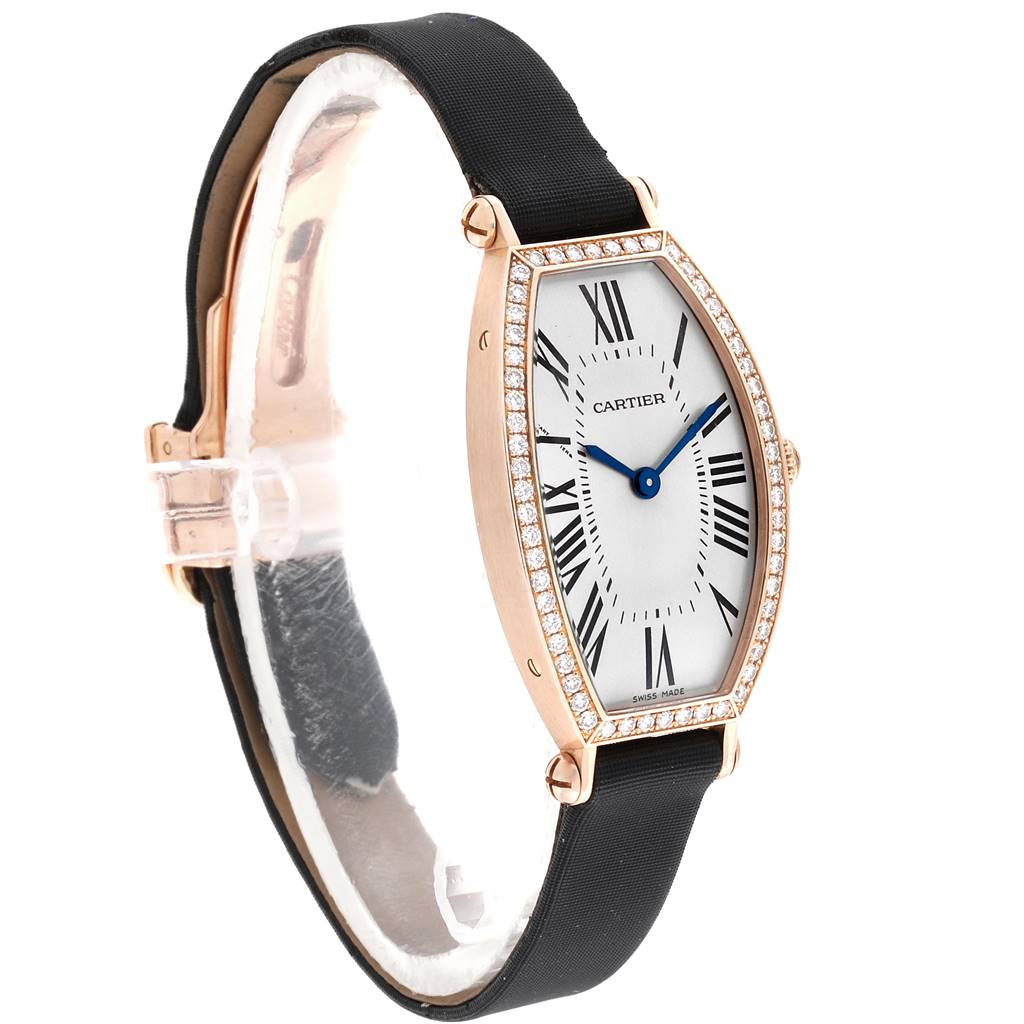 The image shows a side angle of the Cartier Tortue WE400331 Women's Yellow Gold Silver Dial WE400331 Women's Yellow Gold Silver Dial watch, highlighting the black strap, rose gold case, and diamond-encrusted bezel.