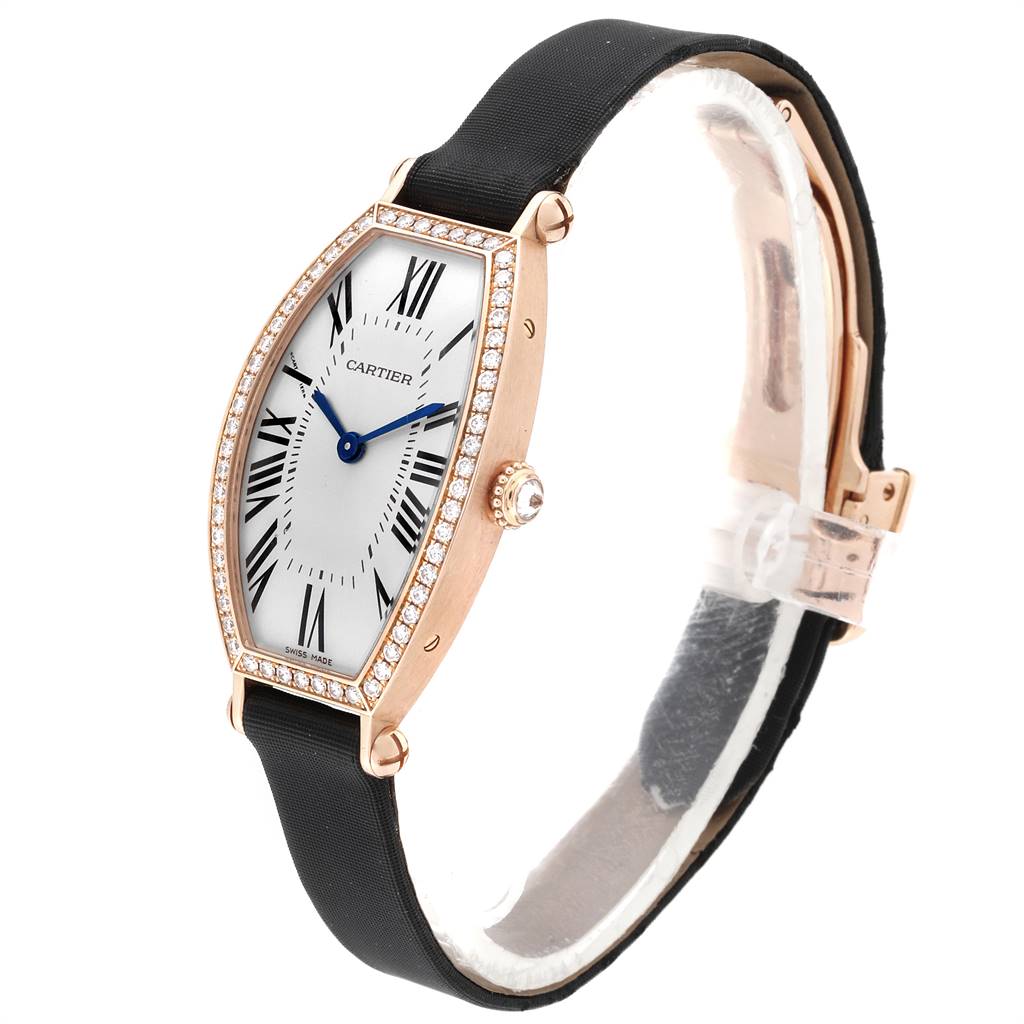 The image shows a Cartier Tortue WE400331 Women's Yellow Gold Silver Dial WE400331 Women's Yellow Gold Silver Dial watch in a side-angle view focusing on its face, strap, and diamond-studded bezel.