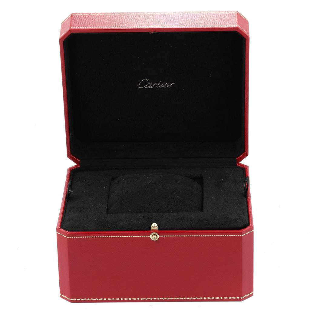 This image shows an open red Cartier watch box for the Tortue model, highlighting its interior packaging.