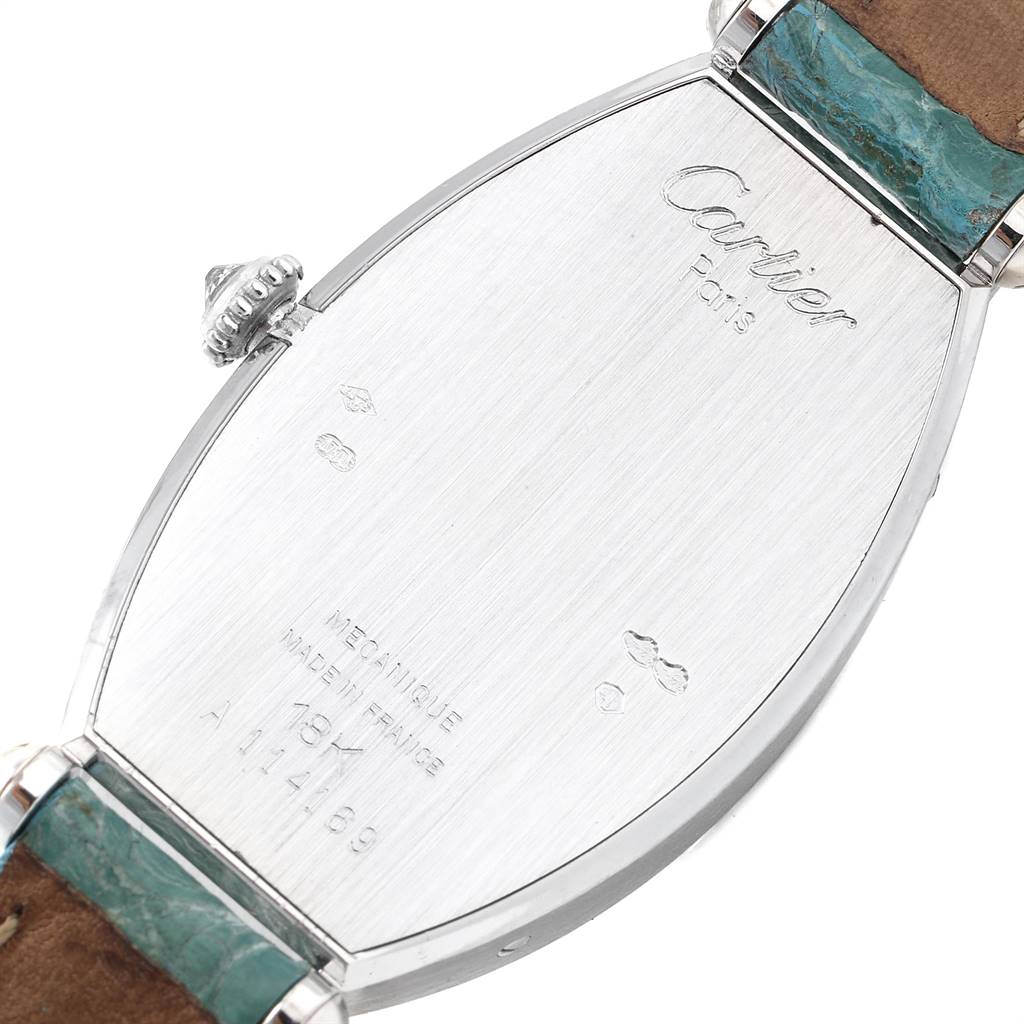 This image shows the back case and crown of a Cartier Tortue WE400131 Women's White Gold White Dial WE400131 Women's White Gold White Dial watch, highlighting its inscriptions and strap attachments.