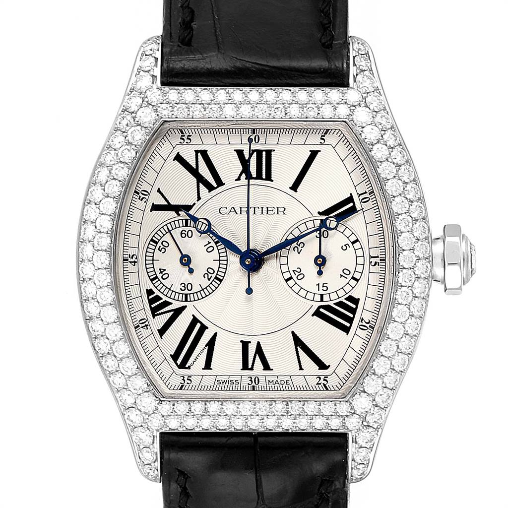 The image shows a top-down view of the Cartier Tortue 2396G Women's White Gold Silver Dial 2396G Women's White Gold Silver Dial watch, highlighting its diamond-encrusted bezel, Roman numeral dial, and black leather strap.