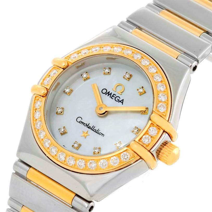 The image shows a close-up of the dial and part of the bracelet of the Omega 1365.75.00 Women
s Steel and Gold (two tone) Mother of Pearl Dial 1365.75.00 Women
s Steel and Gold (two tone) Mother of Pearl Dial Constellation Mini Steel Yellow Gold Diamond Watch 1365.75.00.