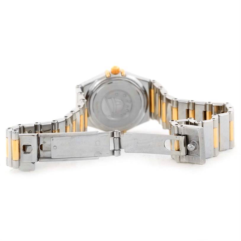 The image shows the back view of the Omega 1365.75.00 Women
s Steel and Gold (two tone) Mother of Pearl Dial 1365.75.00 Women
s Steel and Gold (two tone) Mother of Pearl Dial Constellation Mini Steel Yellow Gold Diamond Watch 1365.75.00 with its bracelet and clasp open.