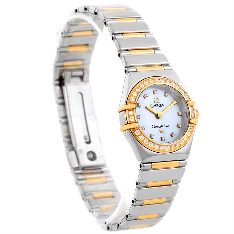 The image shows an angled view of the Omega 1365.75.00 Women
s Steel and Gold (two tone) Mother of Pearl Dial 1365.75.00 Women
s Steel and Gold (two tone) Mother of Pearl Dial Constellation Mini Steel Yellow Gold Diamond Watch 1365.75.00, highlighting its bracelet and diamond bezel.