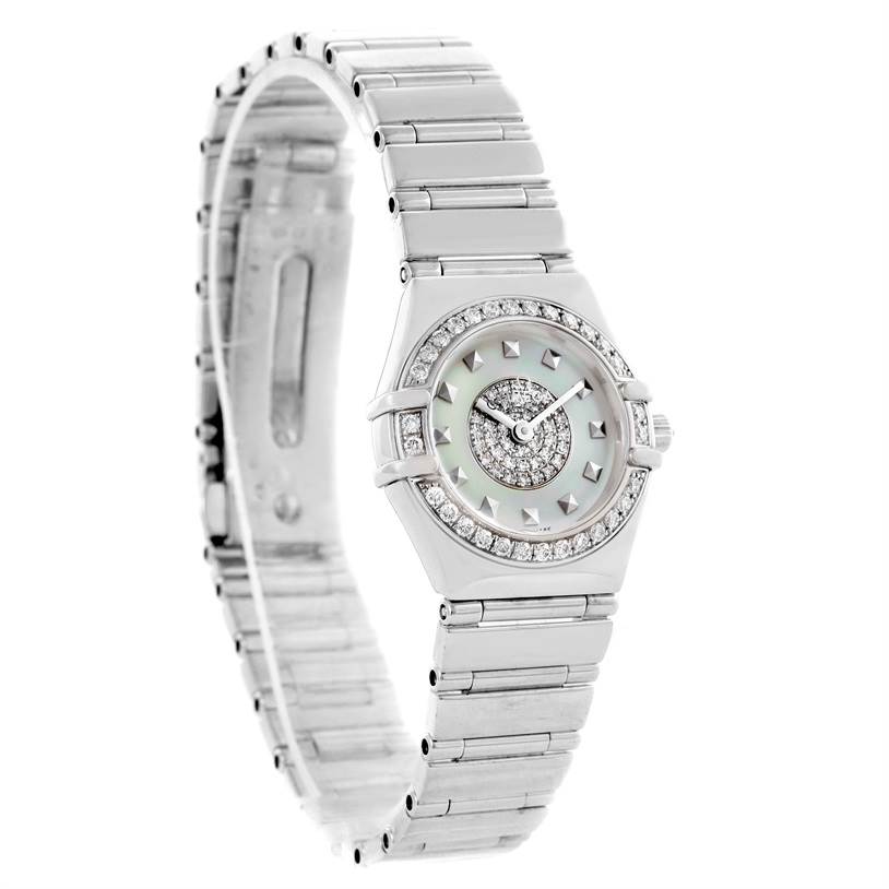 The image shows an angled view of the Omega Women's White Gold Mother of Pearl Dial Women's White Gold Mother of Pearl Dial Constellation Specialties 18K White Gold Pave Diamond Ladies Watch, highlighting its bracelet and face.