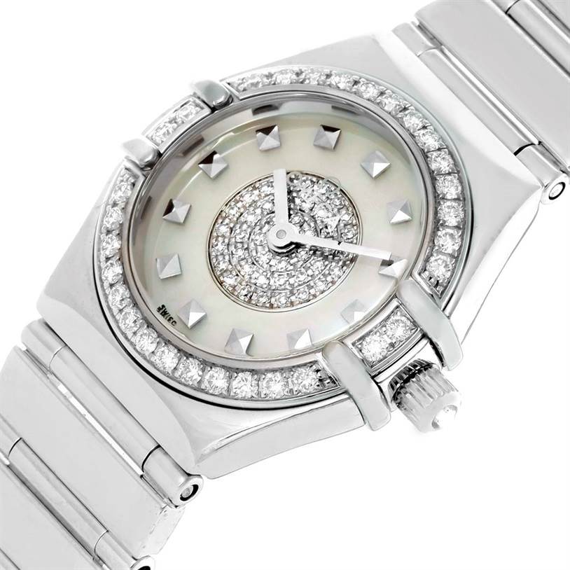 The image shows a close-up of the face and bezel of the Omega Women's White Gold Mother of Pearl Dial Women's White Gold Mother of Pearl Dial Constellation Specialties 18K White Gold Pave Diamond Ladies Watch.
