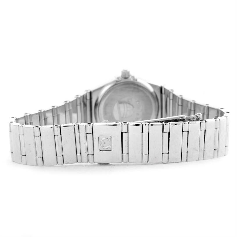 The image shows the back view of the bracelet and case of an Omega Women's White Gold Mother of Pearl Dial Women's White Gold Mother of Pearl Dial Constellation Specialties 18K White Gold Pave Diamond Ladies Watch.