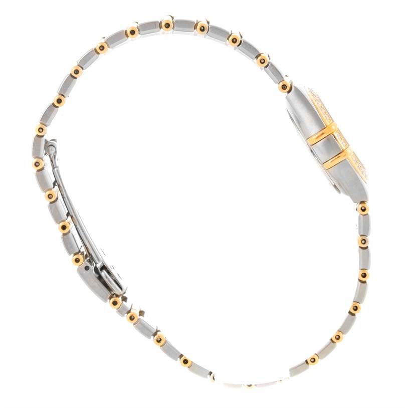 The image shows a side view of the Omega 1267.75.00 Women
s Steel and Gold (two tone) Mother of Pearl Dial 1267.75.00 Women
s Steel and Gold (two tone) Mother of Pearl Dial Constellation My Choice Mini Steel Gold Diamond Watch 1267.75.00, highlighting the clasp and bracelet.