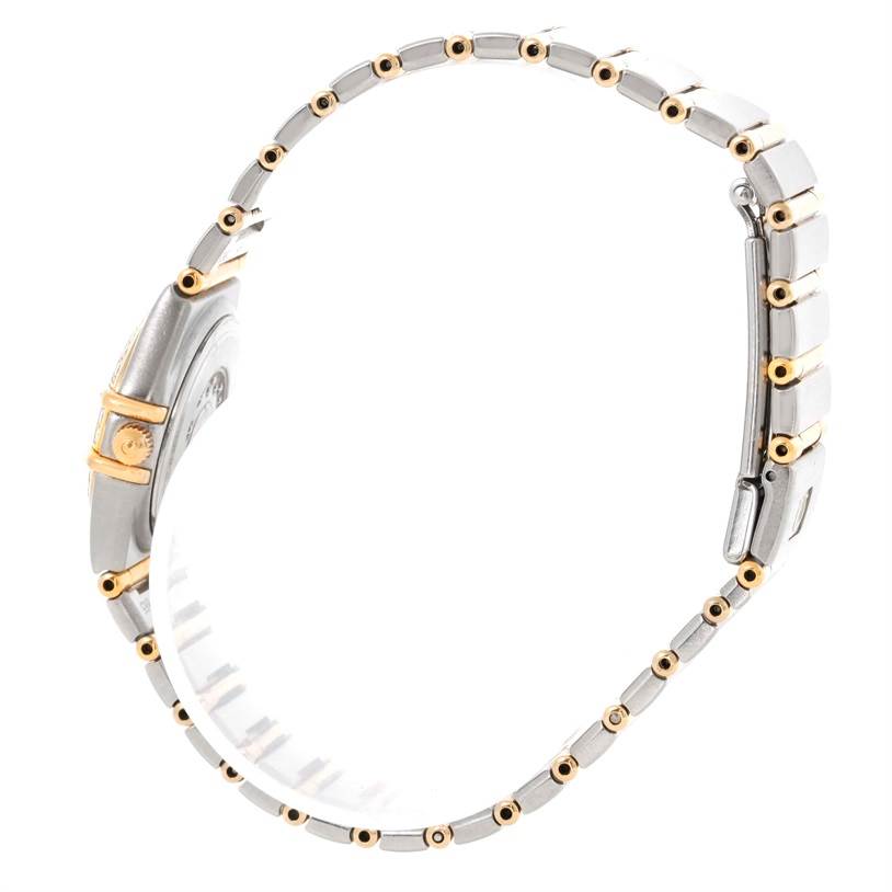 The image shows a side profile of the Omega 1267.75.00 Women
s Steel and Gold (two tone) Mother of Pearl Dial 1267.75.00 Women
s Steel and Gold (two tone) Mother of Pearl Dial Constellation My Choice Mini Diamond Watch 1267.75.00, displaying the band and case.