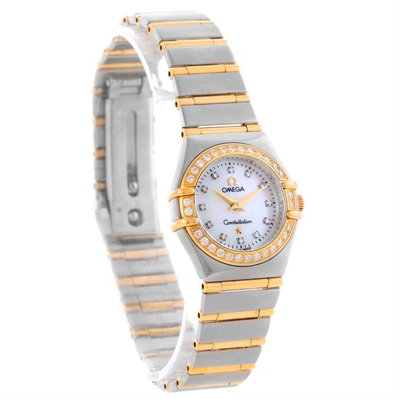 The image shows an Omega 1267.75.00 Women
s Steel and Gold (two tone) Mother of Pearl Dial 1267.75.00 Women
s Steel and Gold (two tone) Mother of Pearl Dial Constellation My Choice Mini Diamond Watch 1267.75.00 at an angle displaying its face and partial bracelet.