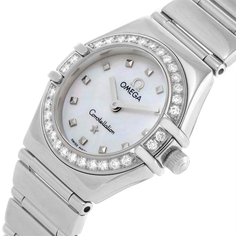 The image shows an angled close-up view of the Omega 1465.71.00 Women
s Stainless Steel Mother of Pearl Dial 1465.71.00 Women
s Stainless Steel Mother of Pearl Dial Constellation My Choice Ladies Mini Diamond Watch 1465.71.00, highlighting its dial, bezel, and bracelet.