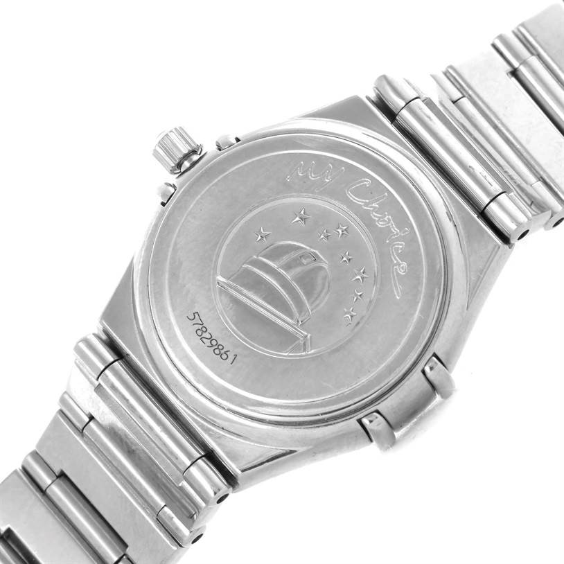 The image shows the back case and part of the bracelet of the Omega 1465.71.00 Women
s Stainless Steel Mother of Pearl Dial 1465.71.00 Women
s Stainless Steel Mother of Pearl Dial Constellation My Choice Ladies Mini Diamond Watch 1465.71.00.