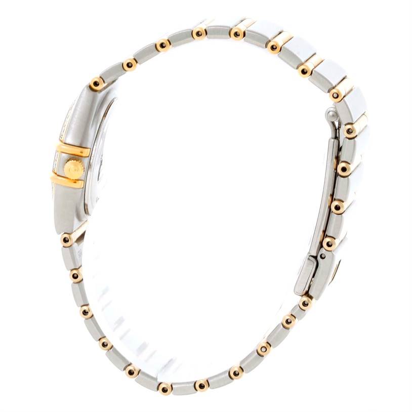 The image shows a side view of the Omega 1267.75.00 Women
s Steel and Gold (two tone) Mother of Pearl Dial 1267.75.00 Women
s Steel and Gold (two tone) Mother of Pearl Dial Constellation My Choice Mini Two Tone Diamond Watch 1267.75.00, highlighting its band and crown.