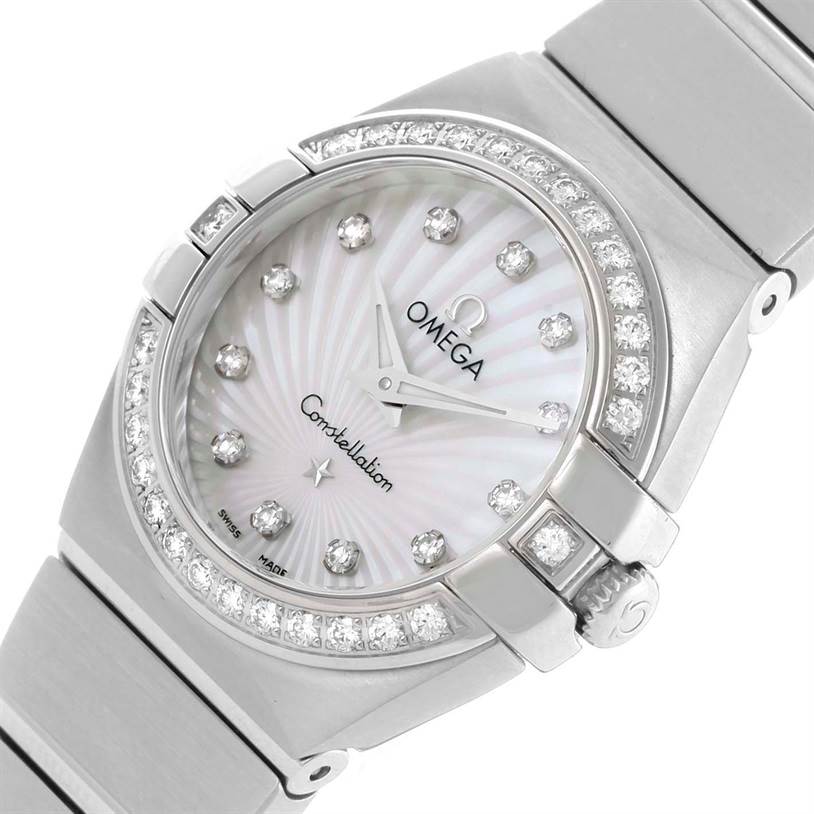 The image shows the face and part of the band of an Omega 123.15.27.60.55.002 Women
s Stainless Steel Mother of Pearl Dial 123.15.27.60.55.002 Women
s Stainless Steel Mother of Pearl Dial Constellation 27mm Diamond Watch 123.15.27.60.55.002, unworn model, from an angle slightly above and to the right.