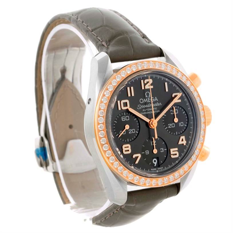 The Omega 324.28.38.40.06.001 Men's Steel and Gold (two tone) Grey Dial 324.28.38.40.06.001 Men's Steel and Gold (two tone) Grey Dial Speedmaster Chronograph Diamond Watch 324.28.38.40.06.001 is shown at an angle highlighting the face, bezel, and strap.