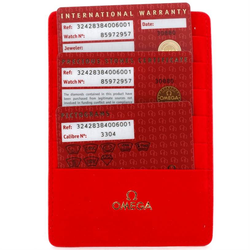 The image shows the warranty and certification cards for the Omega 324.28.38.40.06.001 Men's Steel and Gold (two tone) Grey Dial 324.28.38.40.06.001 Men's Steel and Gold (two tone) Grey Dial Speedmaster Chronograph Diamond Watch 324.28.38.40.06.001.