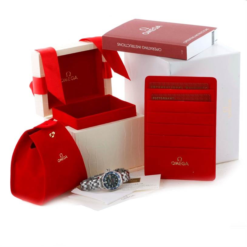 The image shows an Omega 2224.80.00 Women's Stainless Steel Blue Dial 2224.80.00 Women's Stainless Steel Blue Dial Seamaster Professional 300M Ladies Watch model 2224.80.00 with an open box, papers, and accessories.