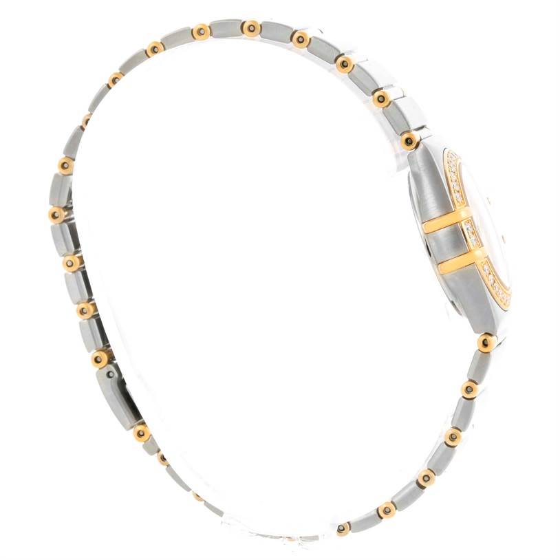 The image shows the side profile of the Omega 1277.30.00 Women's Steel and Gold (two tone) Silver Dial 1277.30.00 Women's Steel and Gold (two tone) Silver Dial Constellation Mini Steel and Gold Textured Dial Diamond Watch 1277.30.00, highlighting the band and bezel.